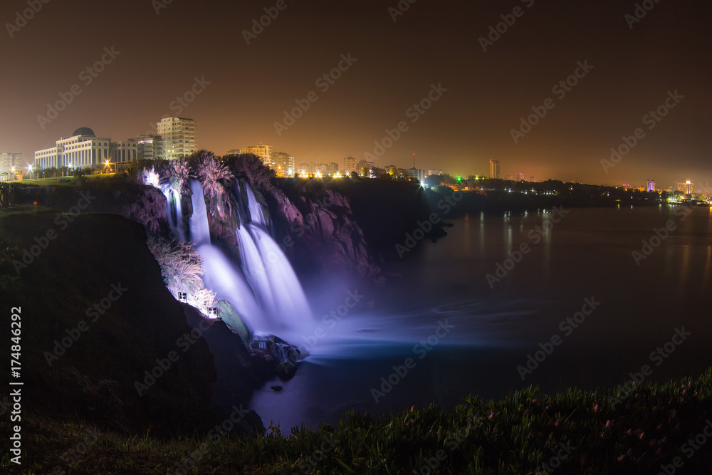 Waterfall Duden at Antalya, Turkey at night - nature travel background. Waterfall on Duden river in Antalya, Turkey. Falls panorama overlooking the sea Waterfall Duden at Antalya, Turkey at night - nature travel background. Waterfall on Duden river in Antalya, Turkey. Falls panorama overlooking the sea