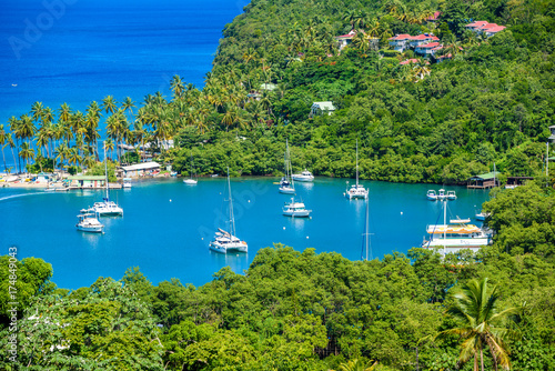 Marigot Bay, Saint Lucia, Caribbean. Tropical bay and beach in exotic and paradise landscape scenery. Marigot Bay is located on the west coast of the Caribbean island of St Lucia.