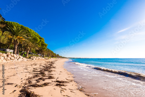 Sand beach in Miami Platja, Tarragona, Catalunya, Spain. Copy space for text. © ggfoto