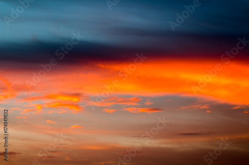 Fototapeta colorful dramatic sky with cloud at sunset.