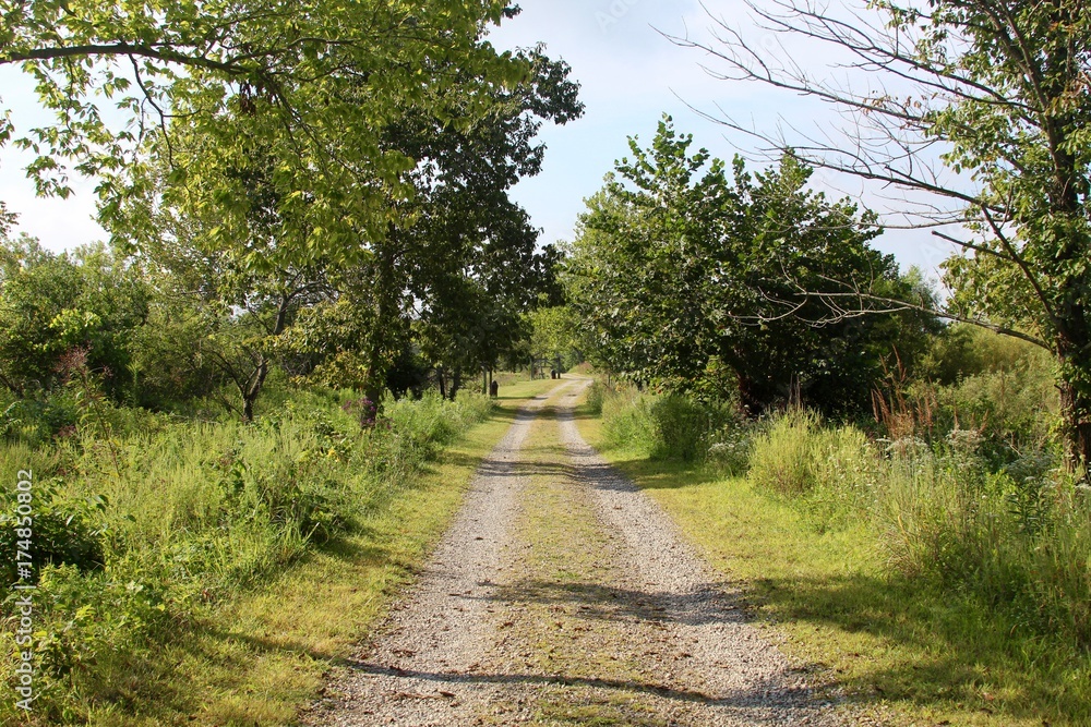 The long gravel road in the countryside.