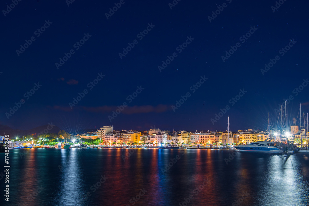 View of the night embankment of the city of Cambrils, Catalunya, Spain. Copy space for text.