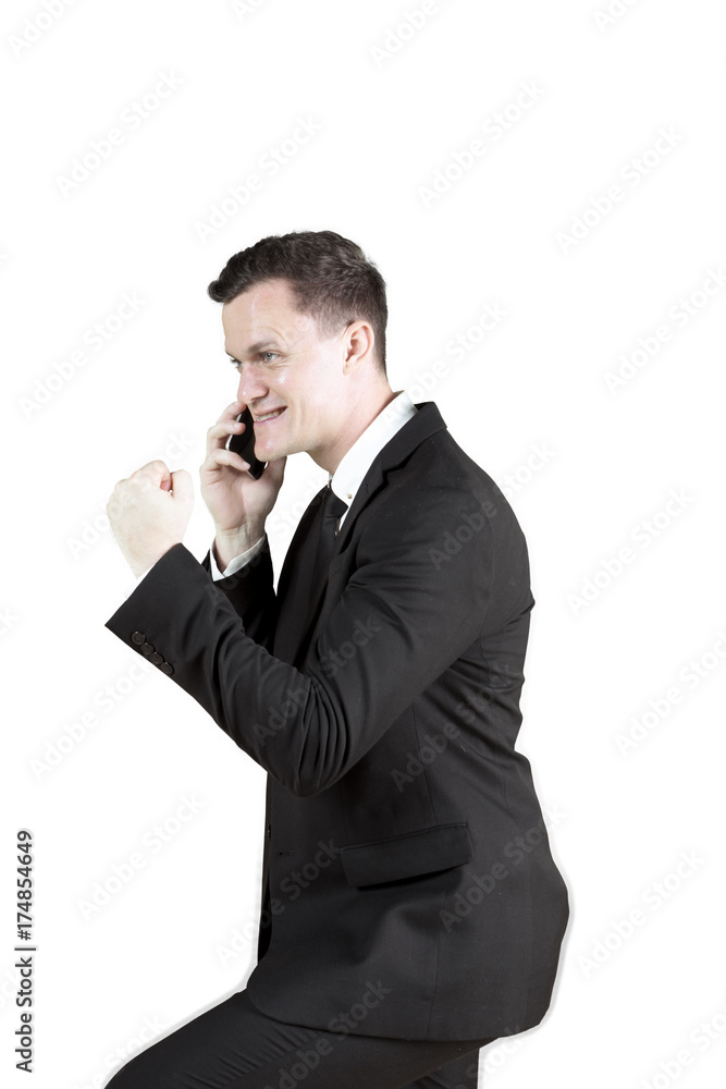 Successful businessman talking on cellphone Successful businessman talking on cellphone