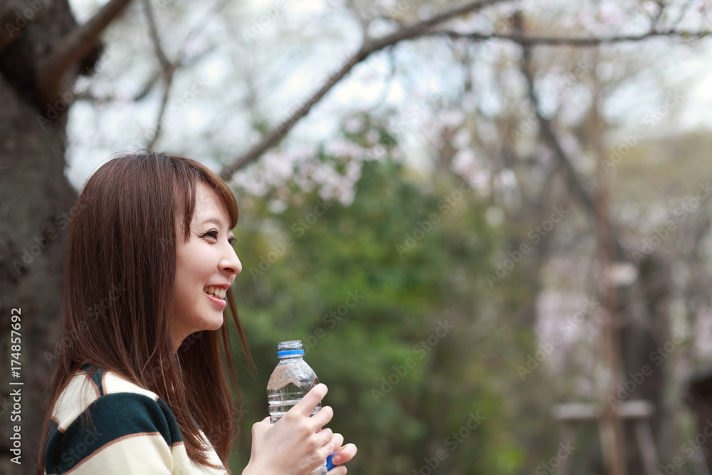 smiling woman with water bottle smiling woman with water bottle