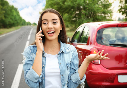 Young woman with cell phone...