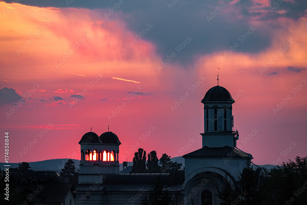 Sunset through church domes