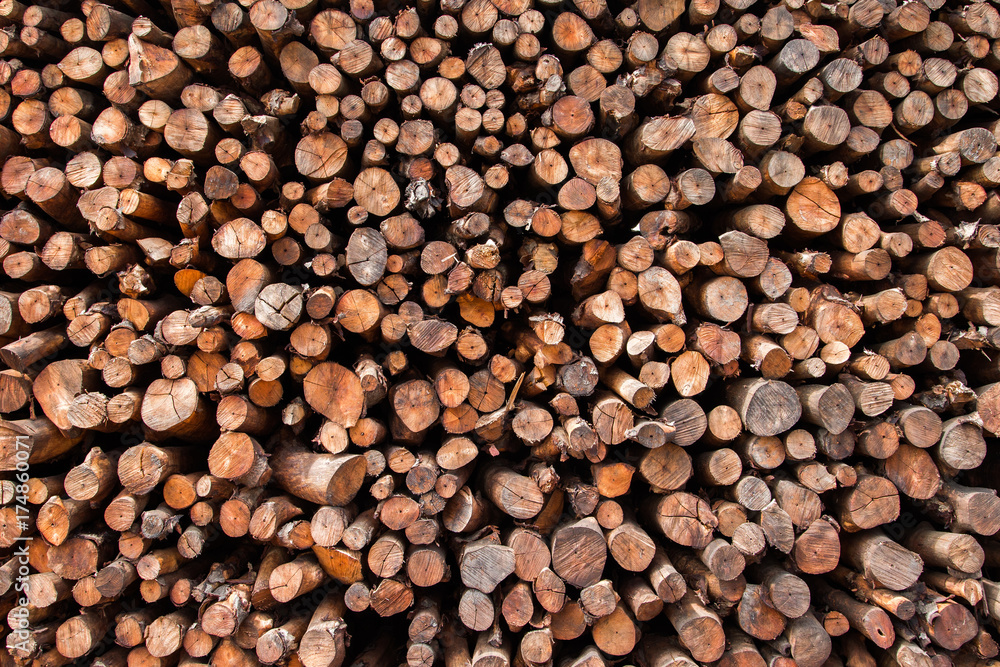 Natural wooden background - closeup of chopped firewood. Natural wooden background - closeup of chopped firewood.
