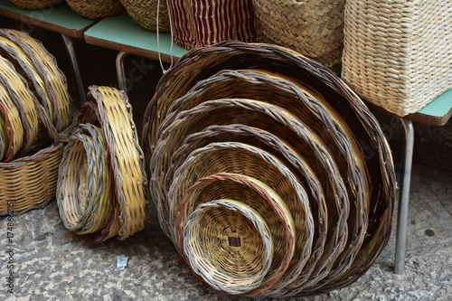 Puglia, Bari, vicolo della città vecchia con prodotti artigianali in mostra photo