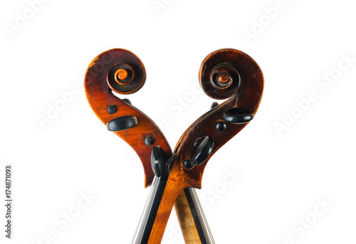 two  violin image .old brown stringed wooden instrument isolated on the white background