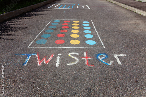 children's game twister on the asphalt photo