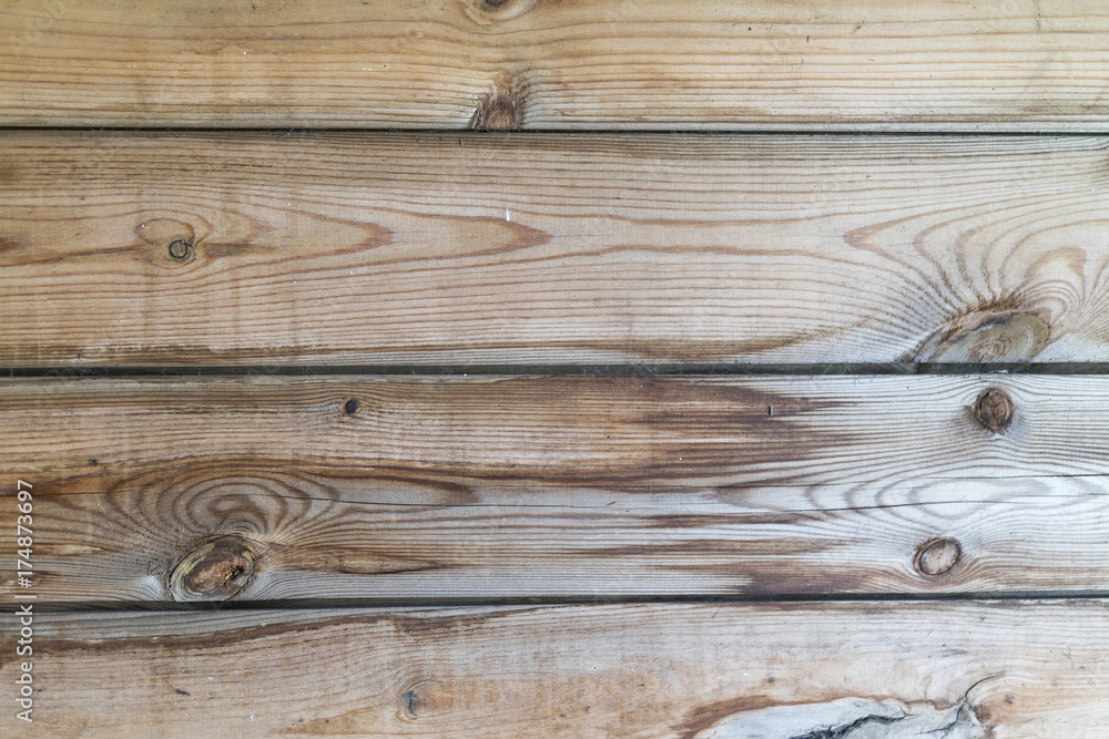 Old wood plank wall from the inside of an old shed Old wood plank wall from the inside of an old shed