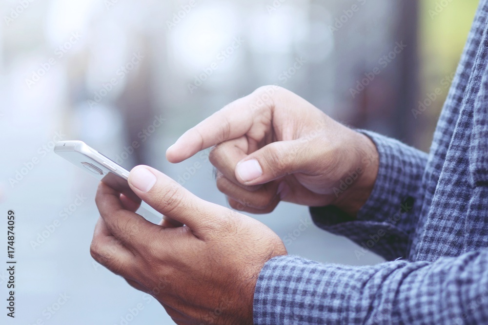 Young Man using mobile smart phone. Young Man using mobile smart phone.
