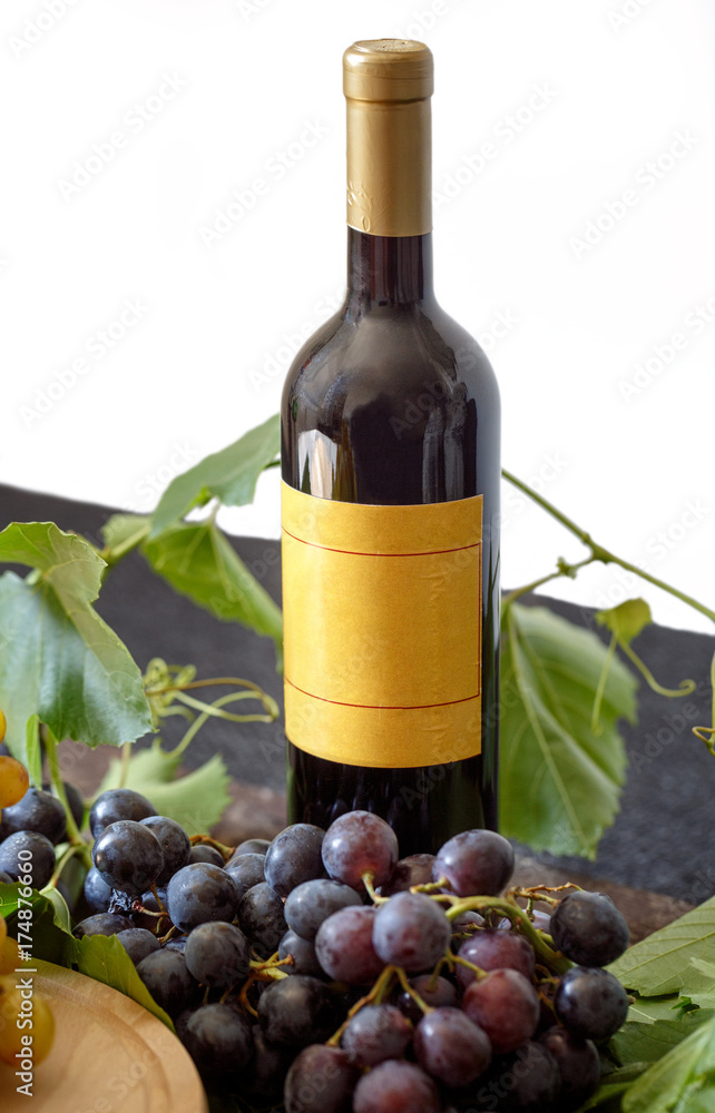 Bottle of white or red wine with grape ..