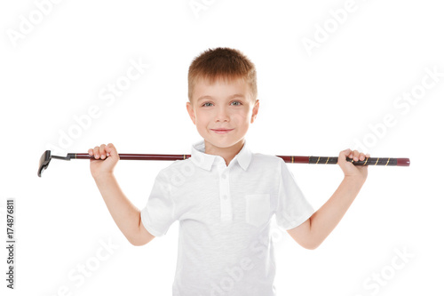 Little boy with golf driver isolated on white