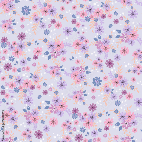Seamless floral pattern. Background in small pink flowers on a lilac background for textiles, fabric, cotton fabric, covers, wallpaper, print, gift wrapping, postcard, scrapbooking.