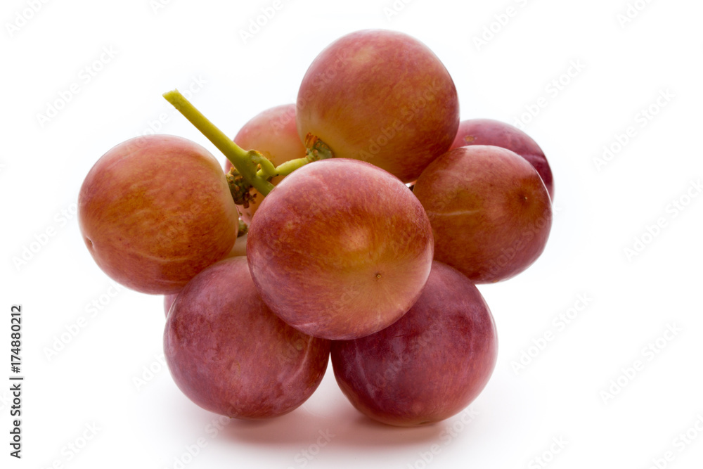 Obraz premium Ripe red grape isolated on white.
