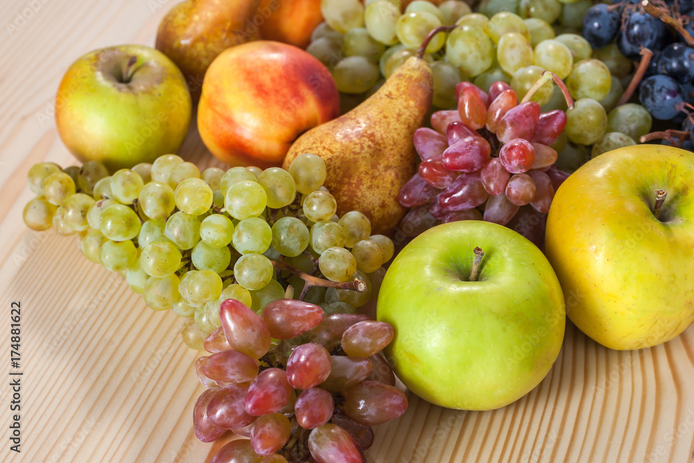 autumnal fruit still life on rustic wooden table background autumnal fruit still life on rustic wooden table background