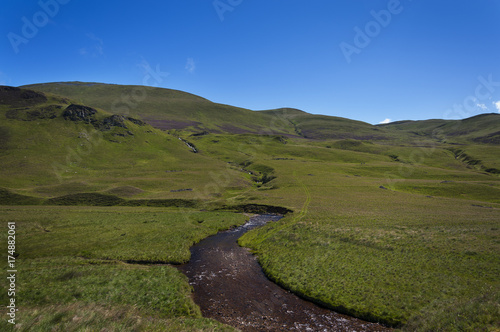 Beautiful winding river in the Highlands of Scotland in United Kingdom  Concept for travel in Scotland