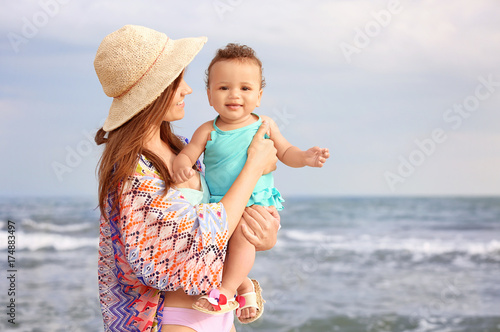 Happy mother with little da...