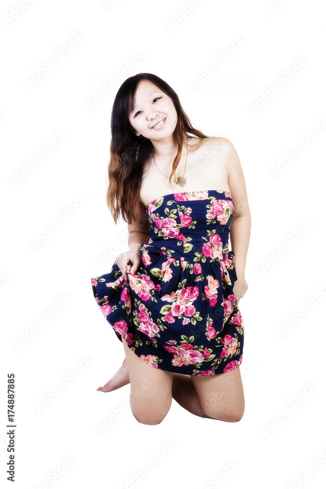 Smiling Chinese American Woman Kneeling In Dress Smiling Chinese American Woman Kneeling In Dress