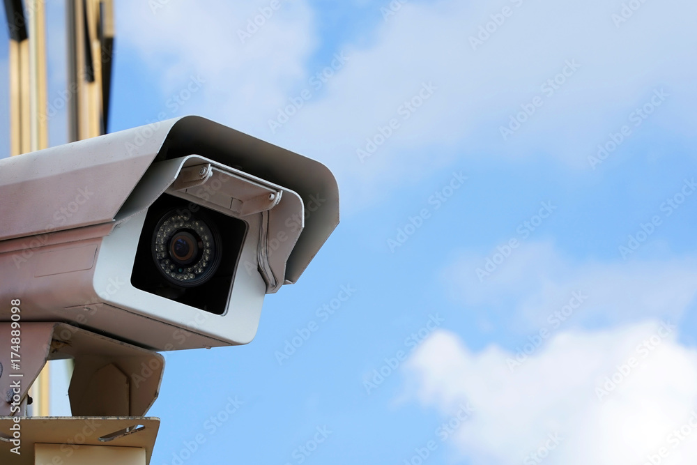 Security camera on blue sky background Security camera on blue sky background