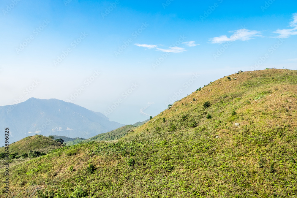 View from cable car see through peak of mountain and sea,Natural landscape view View from cable car see through peak of mountain and sea,Natural landscape view