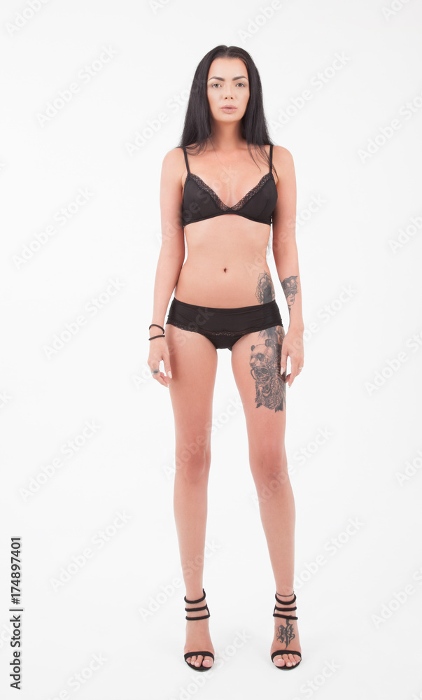 Beautiful full body brunette beauty woman in sexy underwear, isolated on white. Model's snapshoot Beautiful full body brunette beauty woman in sexy underwear, isolated on white. Model's snapshoot