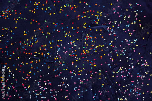 Flatlay of Colorful Round Candy Confetti on Black background