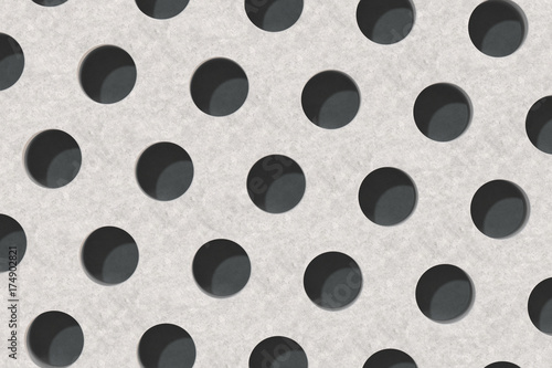 Plain concrete surface with cylindrical holes