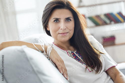 Beautiful young woman look at camera