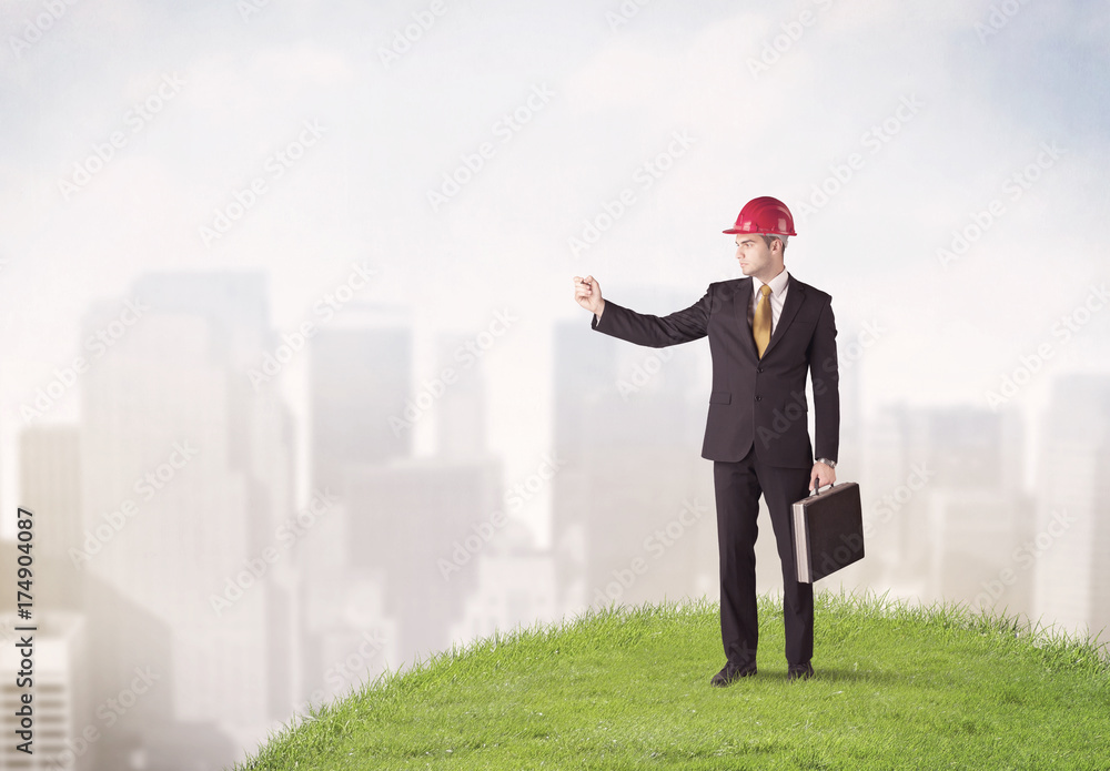 man standing in front of city landscape man standing in front of city landscape