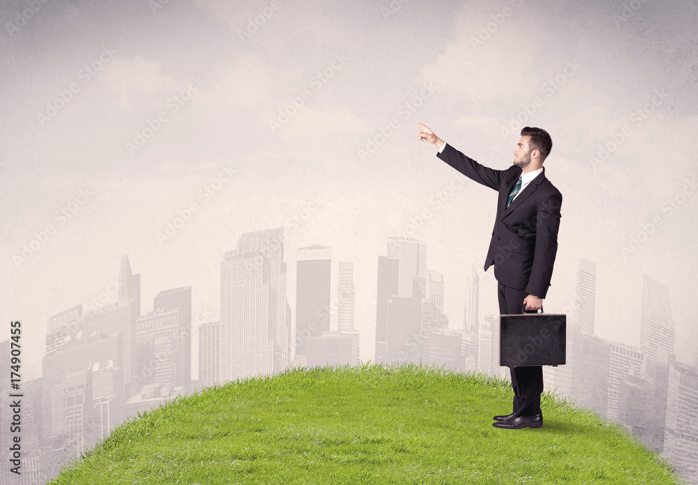 man standing in front of city landscape man standing in front of city landscape