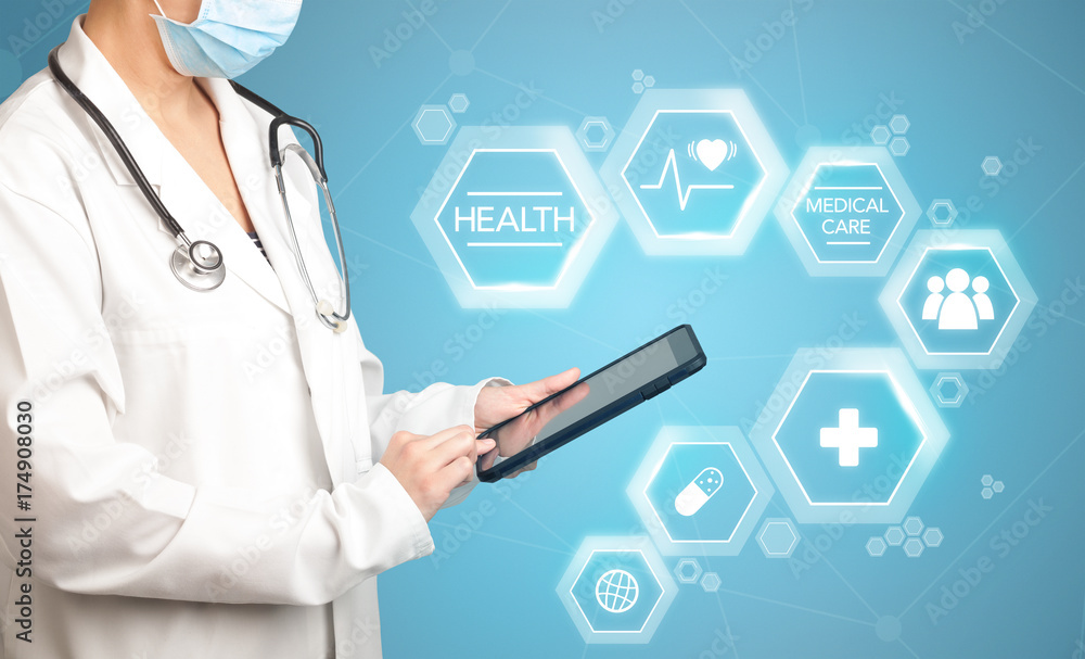 Female doctor with tablet Female doctor with tablet