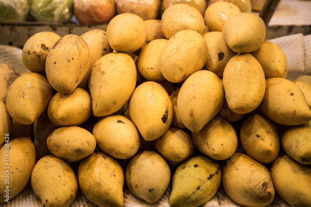 yellow Mango on the counter at the market yellow Mango on the counter at the market