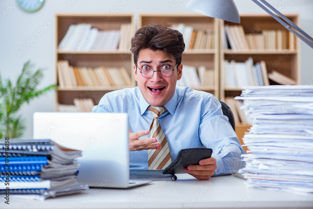 Funny accountant bookkeeper working in the office Funny accountant bookkeeper working in the office