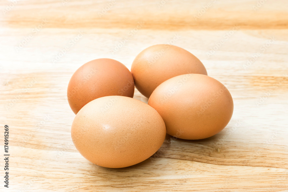 fresh eggs on wooden background fresh eggs on wooden background