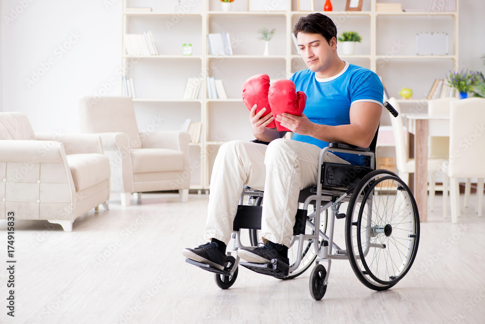 Disabled boxer at wheelchair recovering from injury Disabled boxer at wheelchair recovering from injury