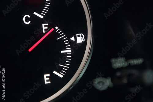 Fuel gauge showing full car fuel