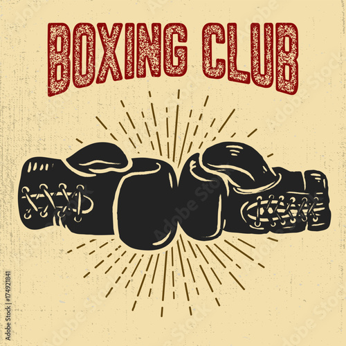 Boxing club. Boxing gloves on grunge background.