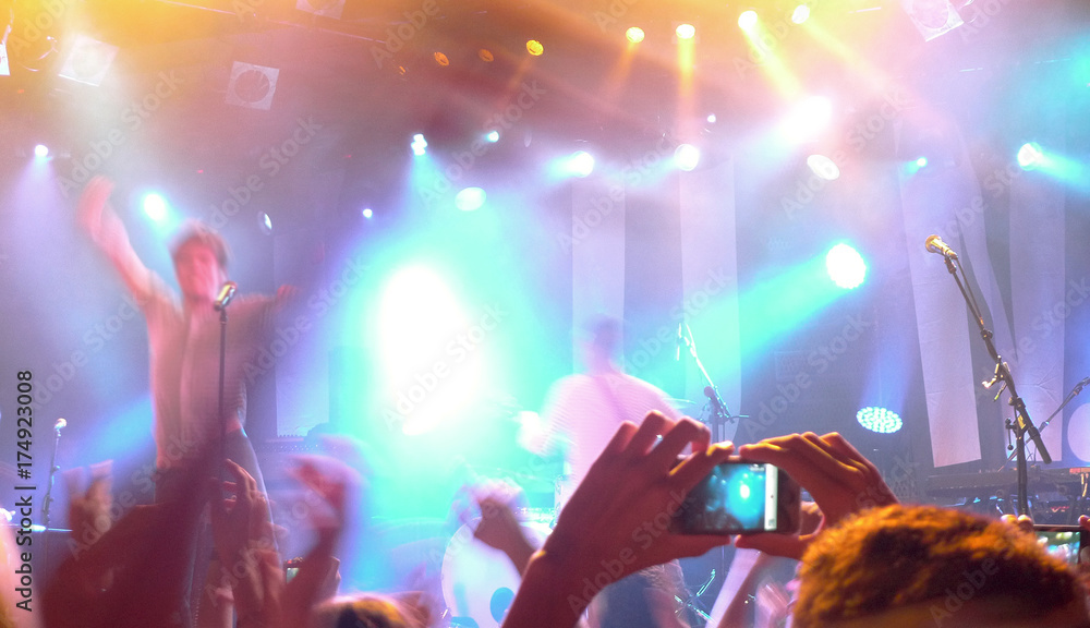 Public having a good time during a concert Public having a good time during a concert