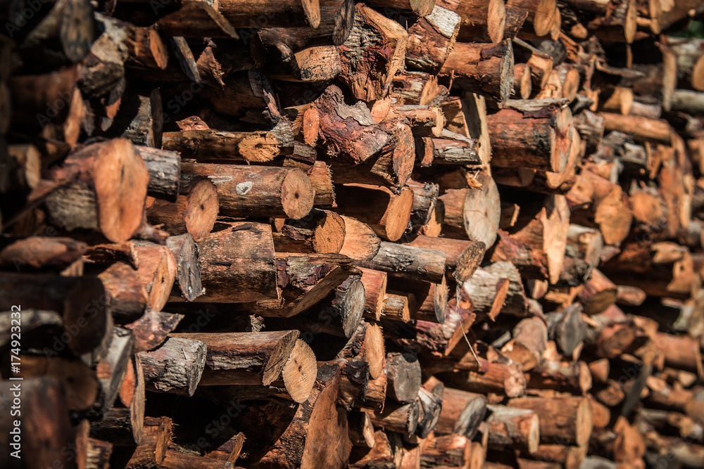 Natural wooden background - closeup of chopped firewood. Natural wooden background - closeup of chopped firewood.