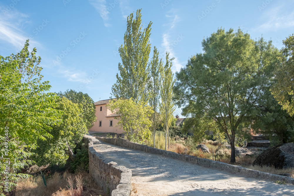 Bridge to access the House next to the marsh located in the area of Barruecos, Caceres, Spain Bridge to access the House next to the marsh located in the area of Barruecos, Caceres, Spain