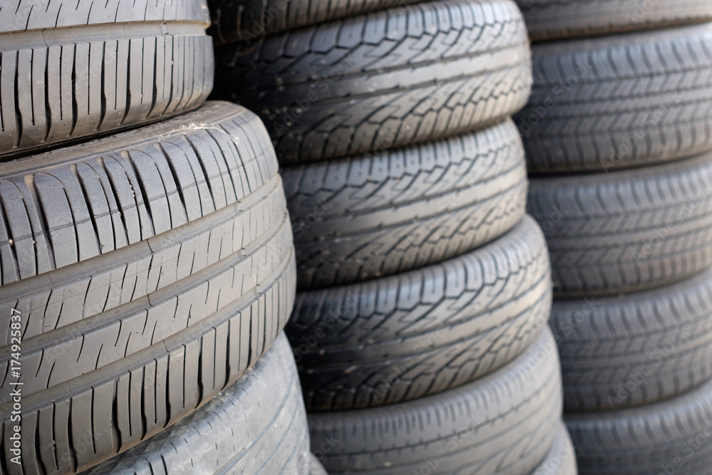 Stack of old car tires. Stack of old car tires.