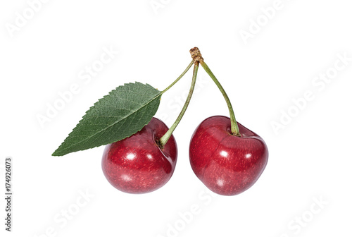 Berries of sweet cherries with leaf on white background