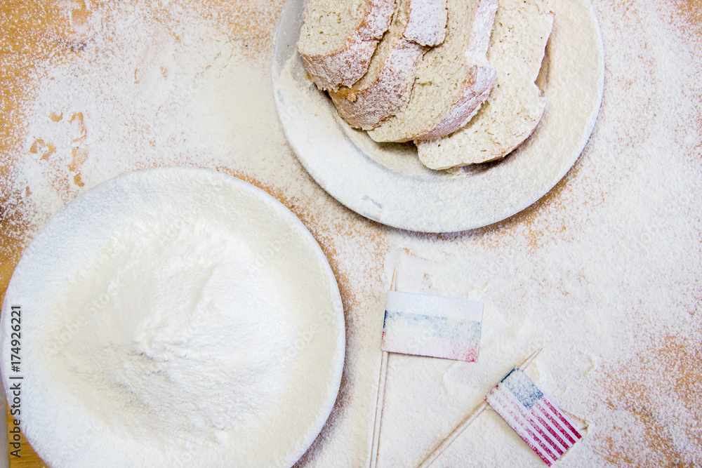 Bread on the floured table Bread on the floured table