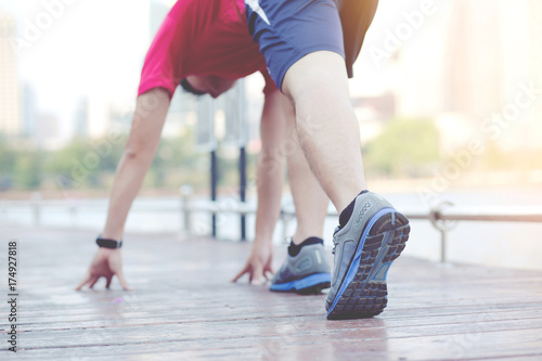 Urban joggers on a big bridge wooden. or Push-up exercise