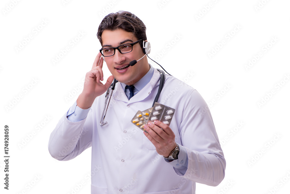 Young doctor with phone headset isolated on white Young doctor with phone headset isolated on white