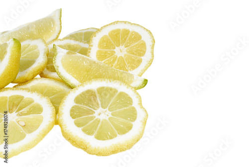 Heap of fresh lemon slices on white background