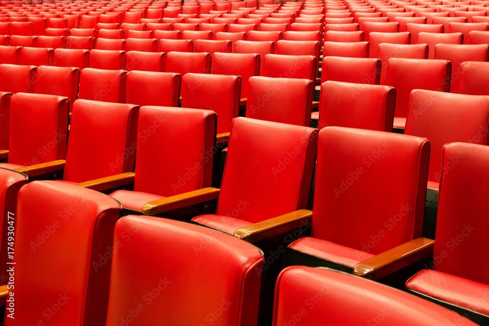 Naklejka premium Empty comfortable red seats Cinema / theater empty seats