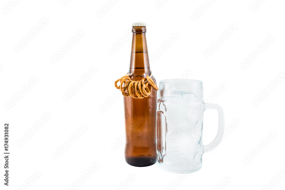 Bottle of beer with pretzels and goblet for beer isolated on white. Bottle of beer with pretzels and goblet for beer isolated on white.